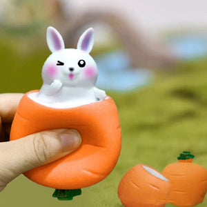 Jouet à presser lapin carotte