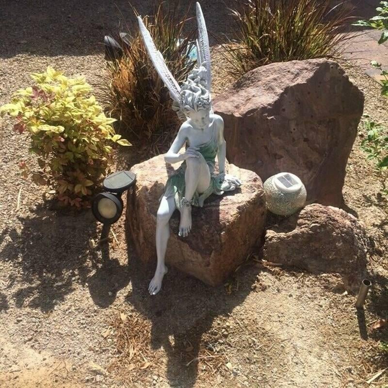Statue de jardin féerique assise