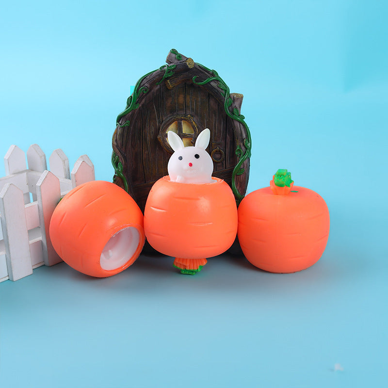 Jouet à presser lapin carotte